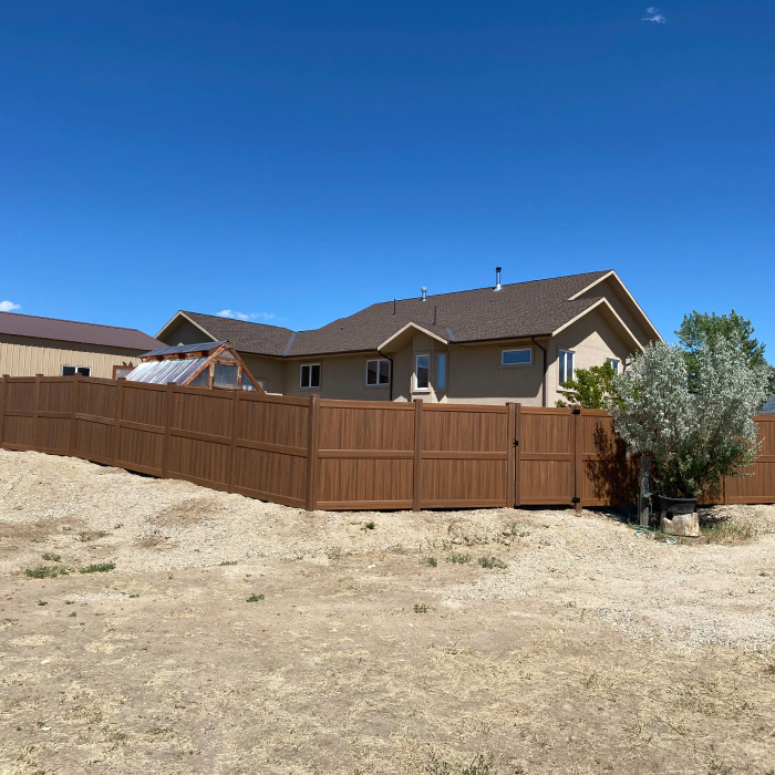 exterior view of a house with a wooden fence installed twin falls id